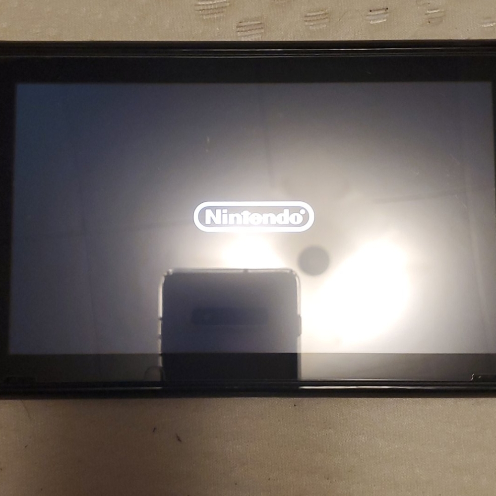 Nitendo switch with extras - Picture 9 of 9